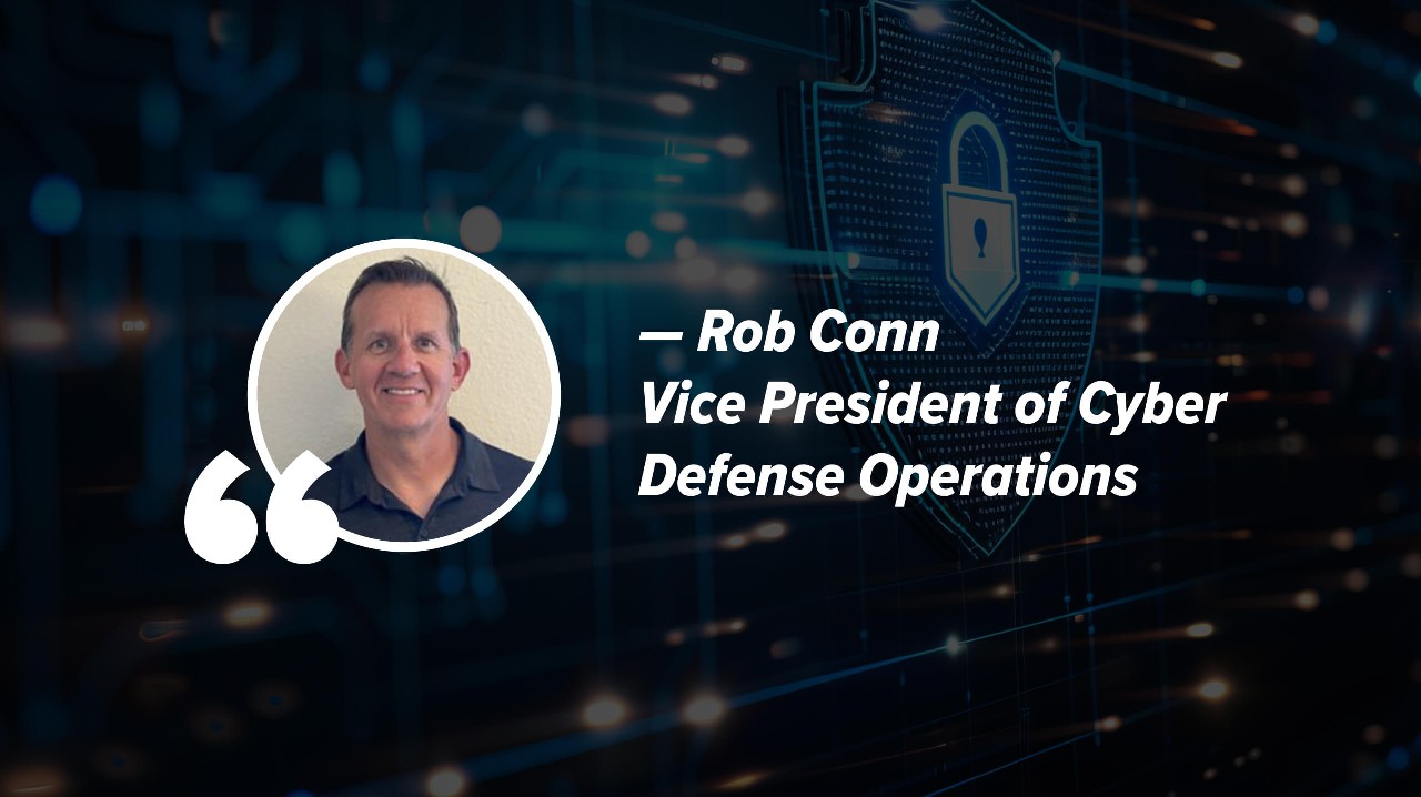 Headshot of Rob Conn in front of a cybersecurity background