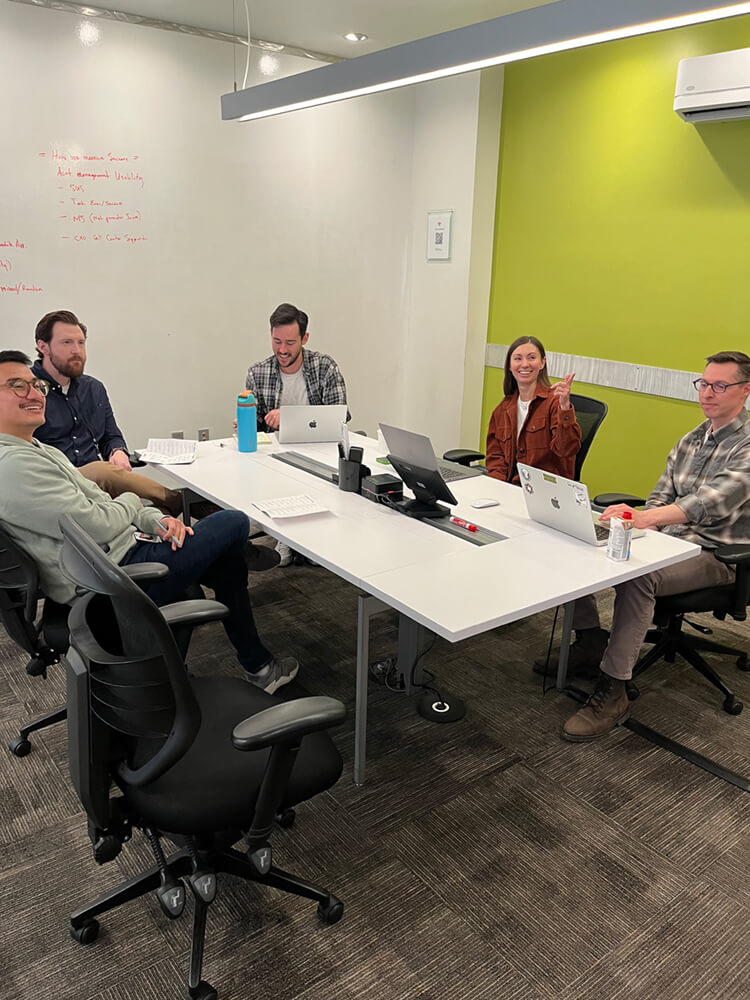 Team collaborating around a table
