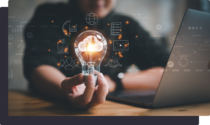A person holding a glowing light bulb with a cloud icon inside, symbolizing innovation and cloud technology, with digital data graphics floating around and a laptop in the background.